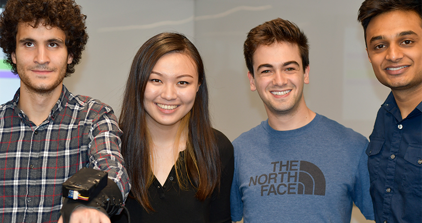 Left to right: Batuhan Demir, Jodie Wei, Harrison Pearl, and Biraj Parikh display their invention, InSight.